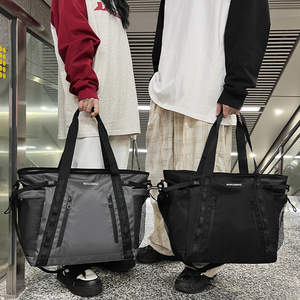 旅行包2024年新款休闲斜挎包大容量男士手提包潮牌女健身包工装包