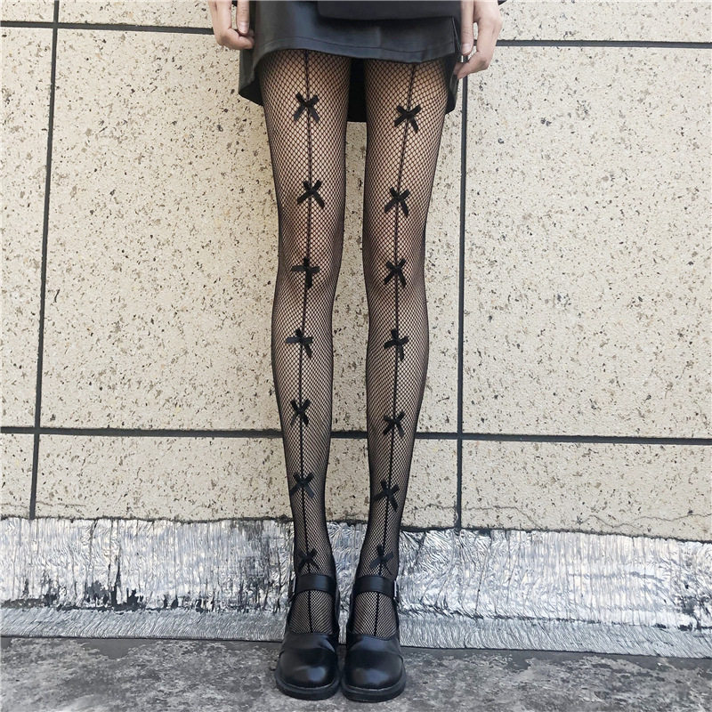 蝴蝶结黑丝袜女性渔网