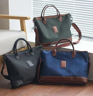 真皮单肩斜挎包男女通用电脑包