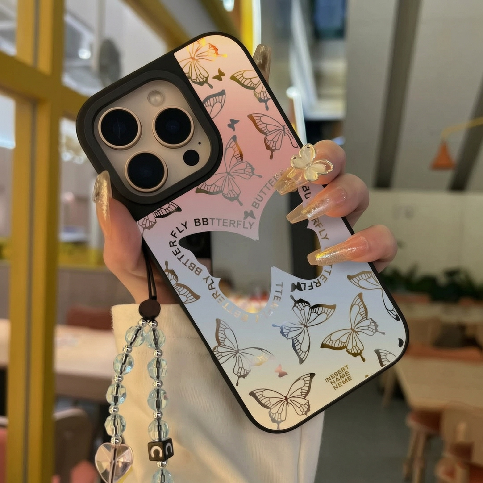 适用于苹果17promax手机壳iphone16promax镂空英文蝴蝶15刀锋12/13套支架17air全包14新款11男女