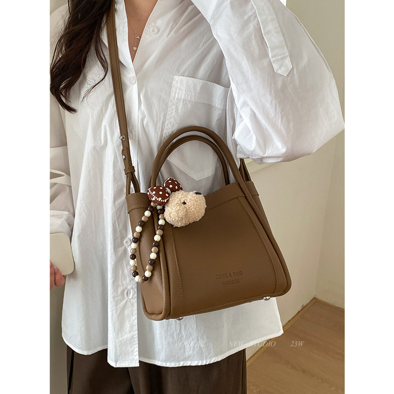 今年流行手提菜篮子包包女2025新款秋冬单肩斜挎包复古通勤水桶包,箱包皮具/热销女包/男包,通用款女包,淘宝优惠券,粉丝福利购,淘宝优惠卷