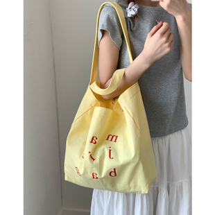 韩系黄色帆布袋包包女2025新款 夏日单肩包大容量通勤腋下托特包