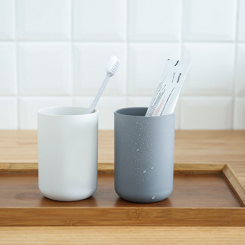 创意牙刷杯架家用pp塑料耐用免打孔无痕贴卫浴洗漱套 牙刷挂