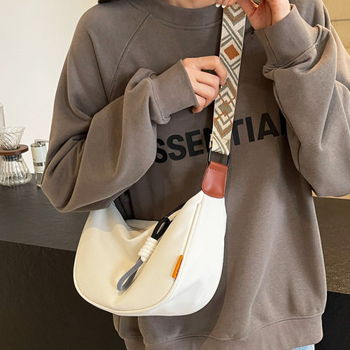 休闲尼龙布包包女夏季斜挎饺子包