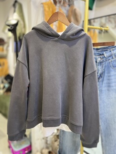 轻奢欧货原创设计前长后短宽松百搭连帽长袖卫衣女上衣短款