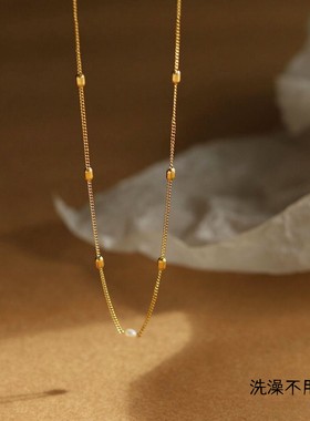 钛钢十字链女椭圆米珠贝珠项链