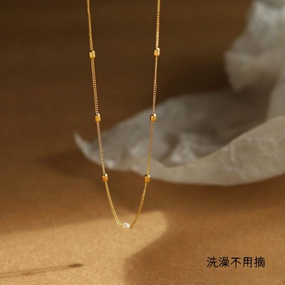 钛钢十字链女椭圆米珠贝珠项链