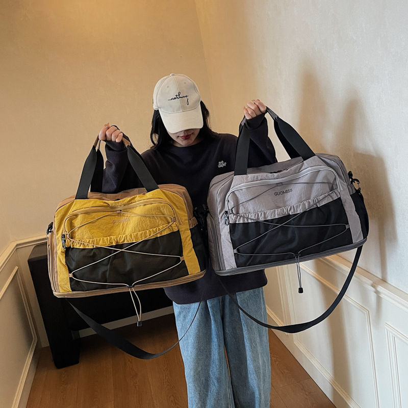 日系潮酷旅行包休闲户外行李袋大容量多用男女斜挎健身包轻便时尚