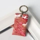Маленький красный брелок