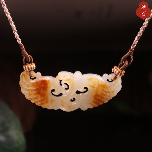 新疆和田玉籽料洒金皮凤凰吊坠