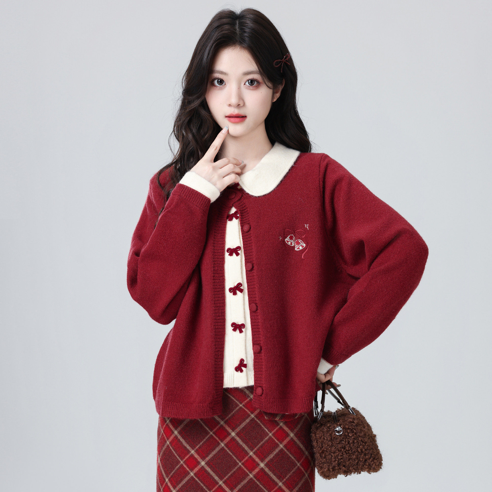 红色假两件毛衣外套女秋冬2026冬季新款蝴蝶结拼接针织开衫短上衣