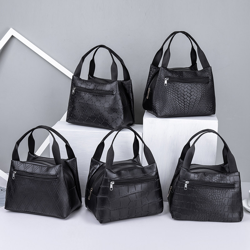 时尚风防水纯色休闲手提女包