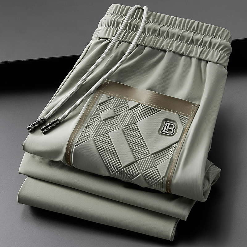 轻奢夏季薄款冰丝滑弹力休闲运动裤男修身高端欧货小脚九分裤男士