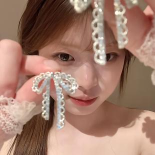 一周饰品不重样2026新款镂空蝴蝶结耳钉女丝带耳饰节日伴手礼