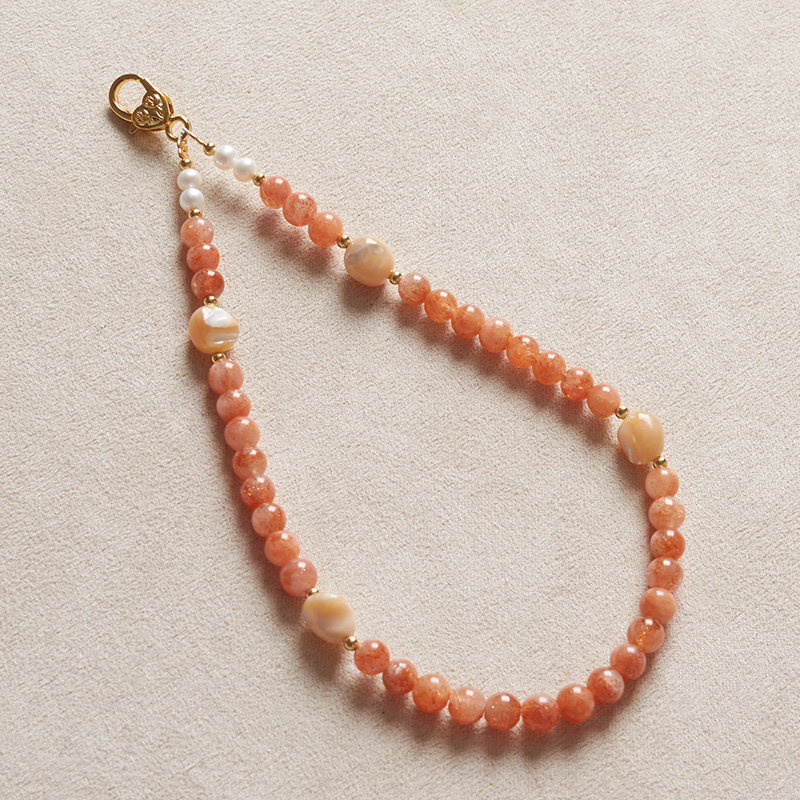 金太阳石手机链挂绳挂件手腕绳女款天然淡水珍珠贝壳手机壳挂链钢丝手