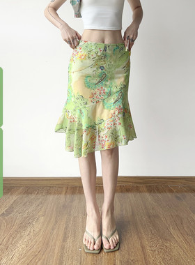 WEEKEEP 夏日小清新绿色印花低腰半身裙百搭不规则修身包臀中长裙
