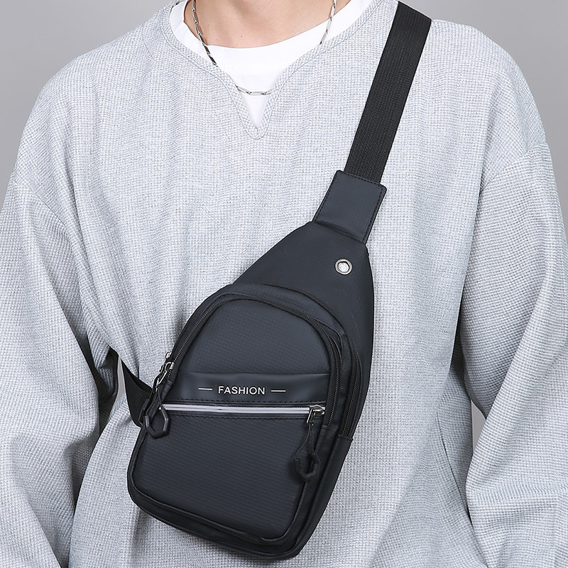 意制胸包男款男士运动休闲胸前包帆布单肩小背包牛津布黑色斜挎包