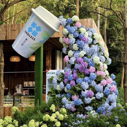 网红仿真鲜花瀑布咖啡杯门头打卡拍照布置户外景区商场美陈大摆件