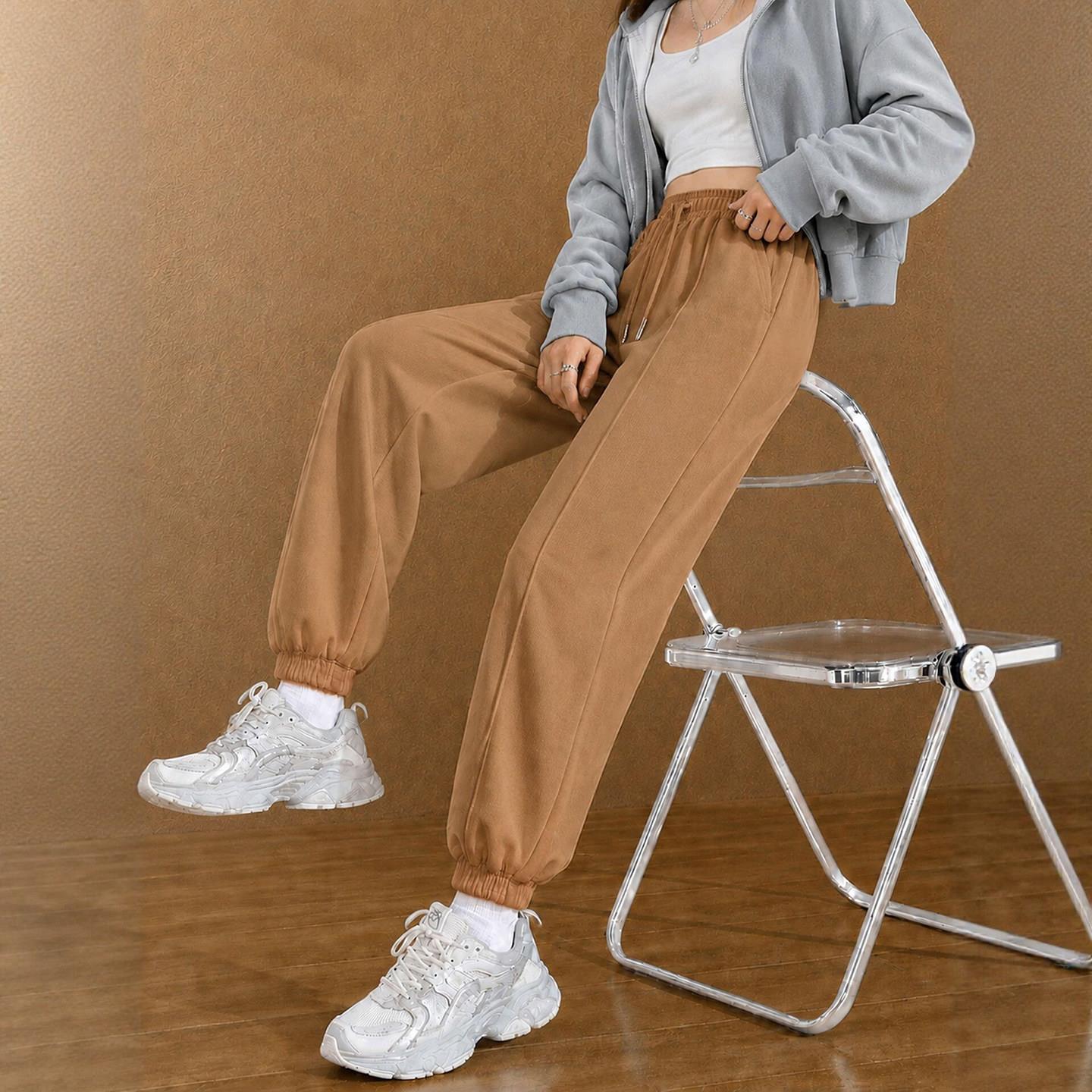 卡其色哈伦束脚卫裤女2026秋季新款小个子九分宽松显瘦休闲运动裤