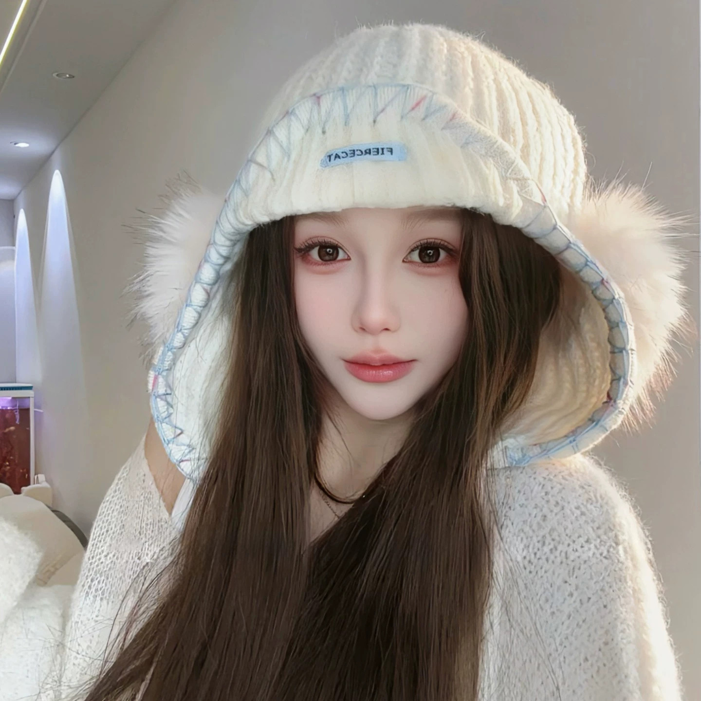 白色针织帽女保暖毛绒护耳雷锋帽