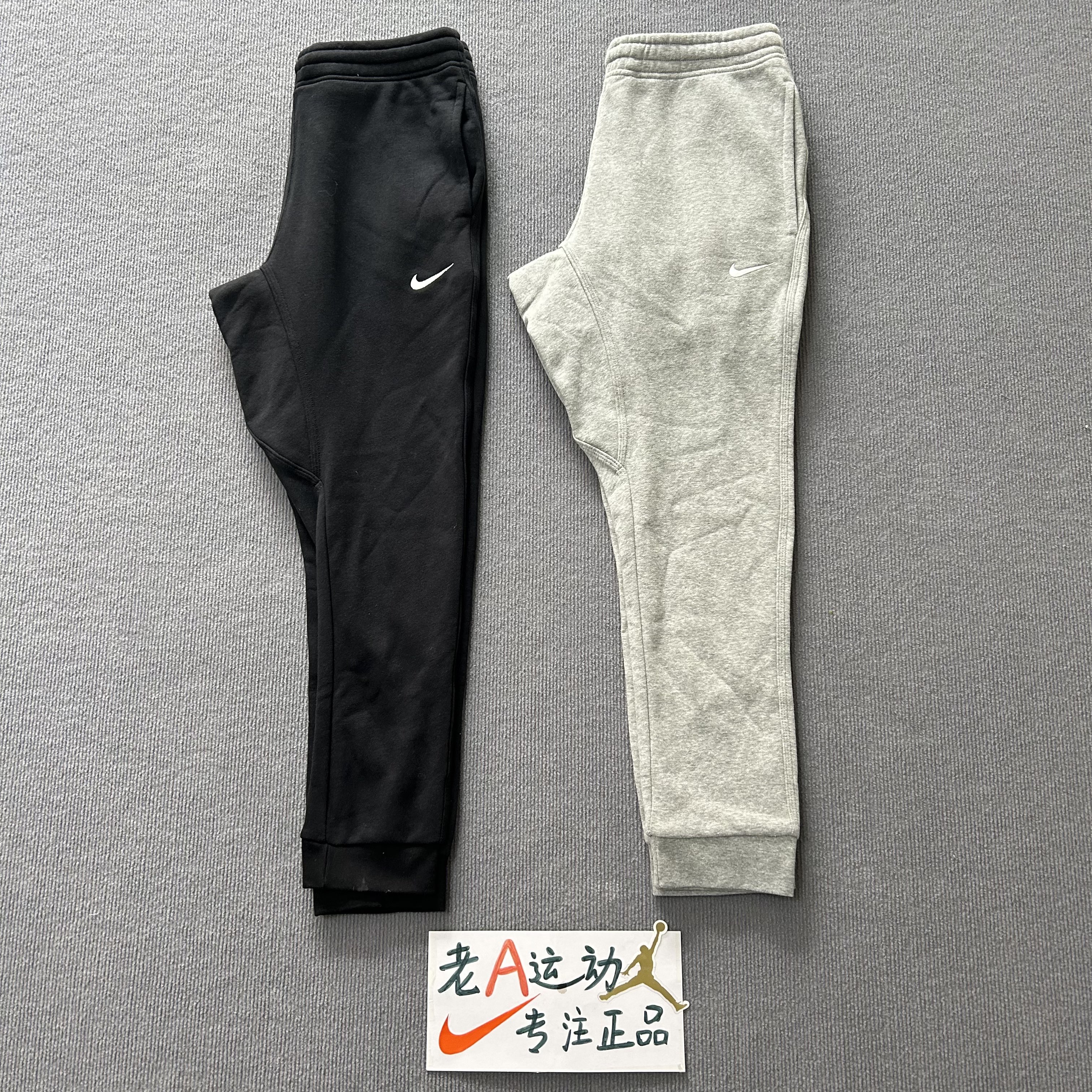 Nike耐克男子经典刺绣小勾logo加绒保暖运动休闲束口长裤716831