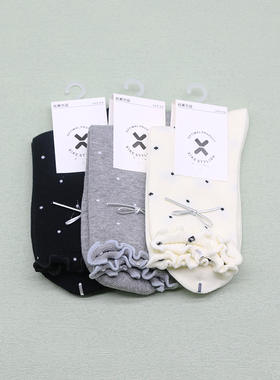 西客优品  秋冬时尚木耳边蝴蝶结波点甜美无骨中筒女童袜252A9744