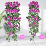 Стена -Связь с цветочным моделированием розовые фальшивые цветочные цветочные роттаны внутренняя гостиная.