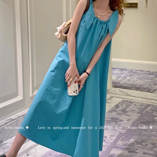 2025新款度假风系带吊带连衣裙女夏季宽松显瘦A字裙蓝色中长裙子