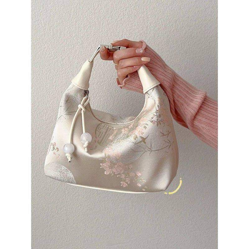 国风丝绸刺绣旗袍包包女2025新款夏季斜挎饺子包古风新中式手提包