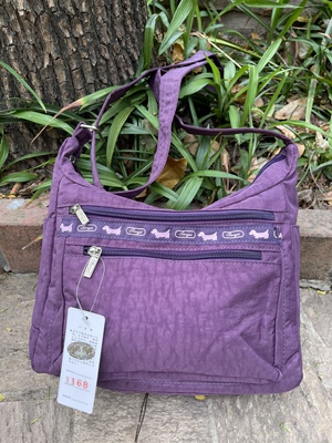 三哥1168黑色紫色母亲节礼物妈妈包旅游包爬山包多隔层包携带包