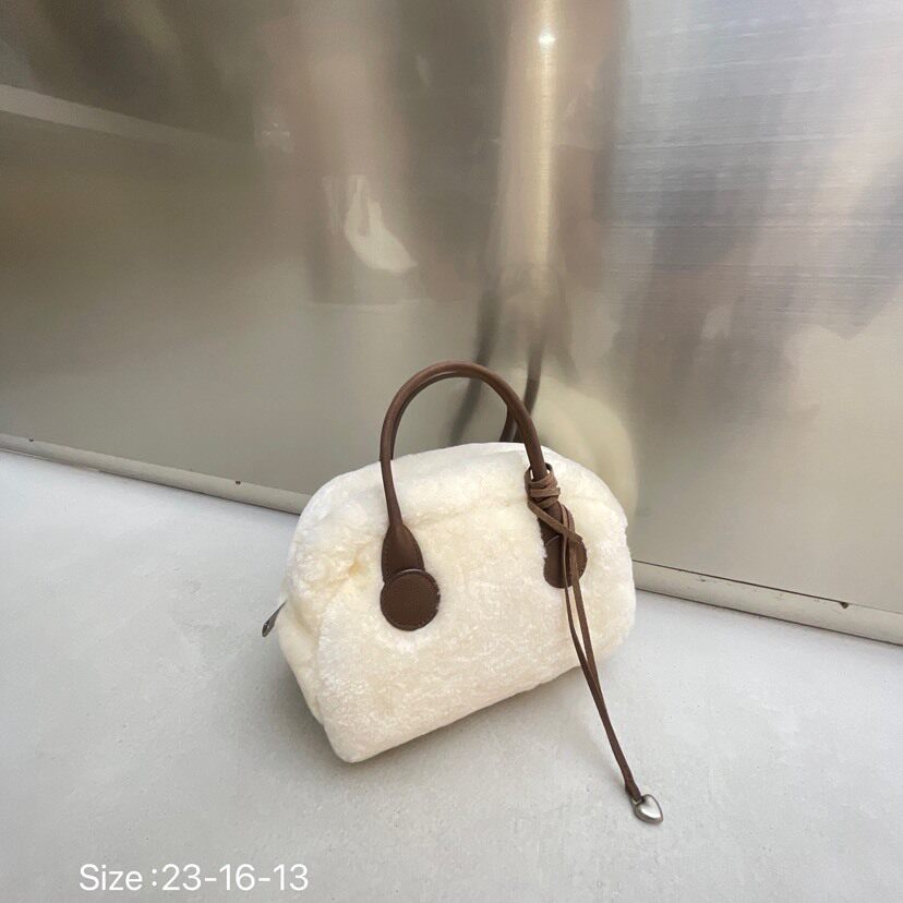 网红同款时尚百搭牛皮撞色毛毛保龄球凹造型小众设计手提单肩包包