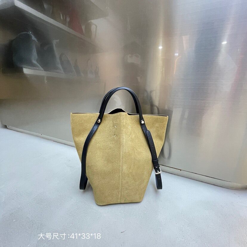 包包女2025撞色复古牛皮磨砂时髦松弛感水桶包发财包大容量托特包
