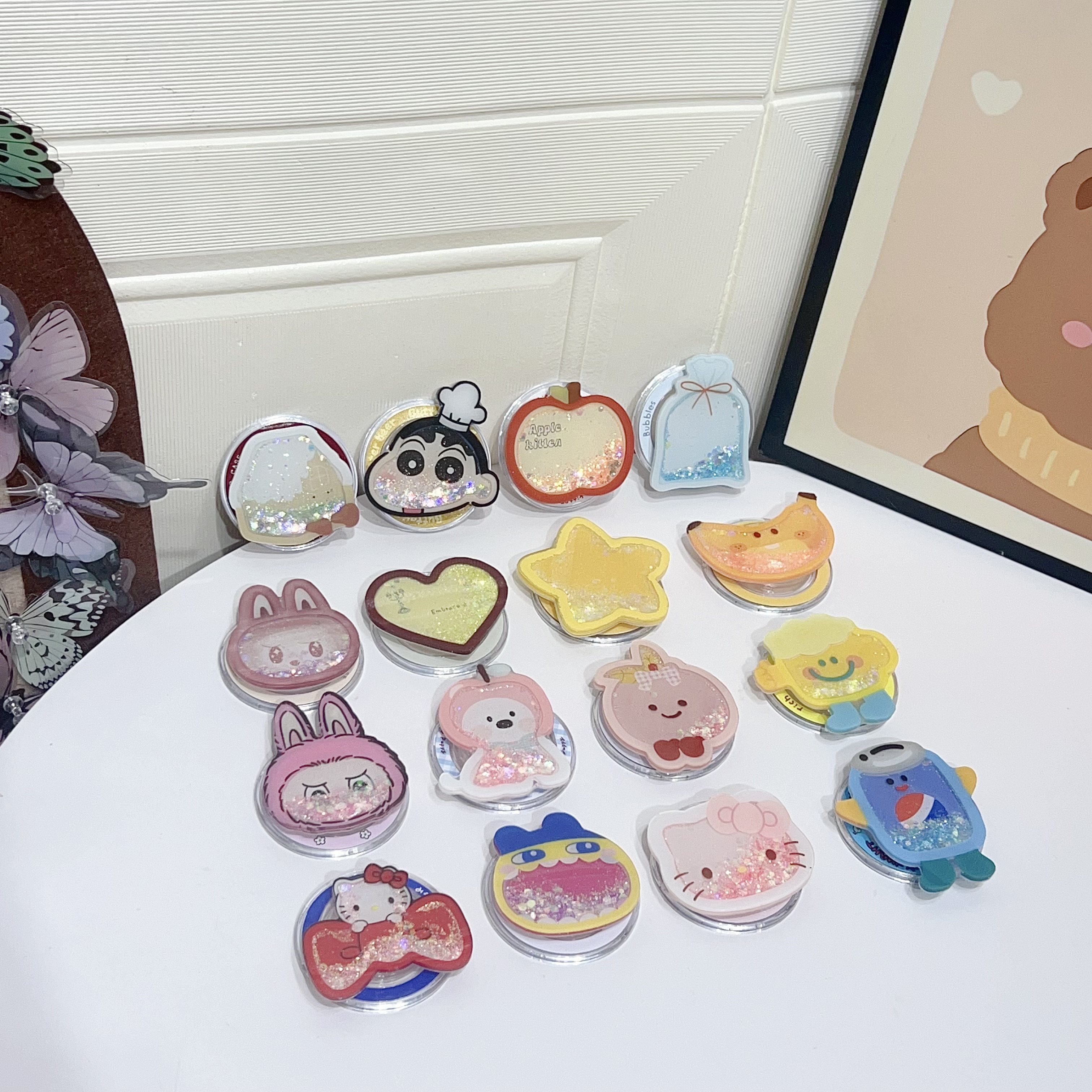 粉色拉布布流沙粘贴手机支架适用苹果华为三星创意伸缩桌面懒人固定追剧百搭超火可爱卡通闪粉女款气囊支架式