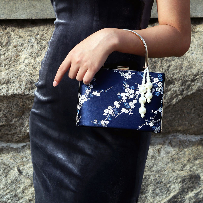 kk9_原创设计梅花复古口金包