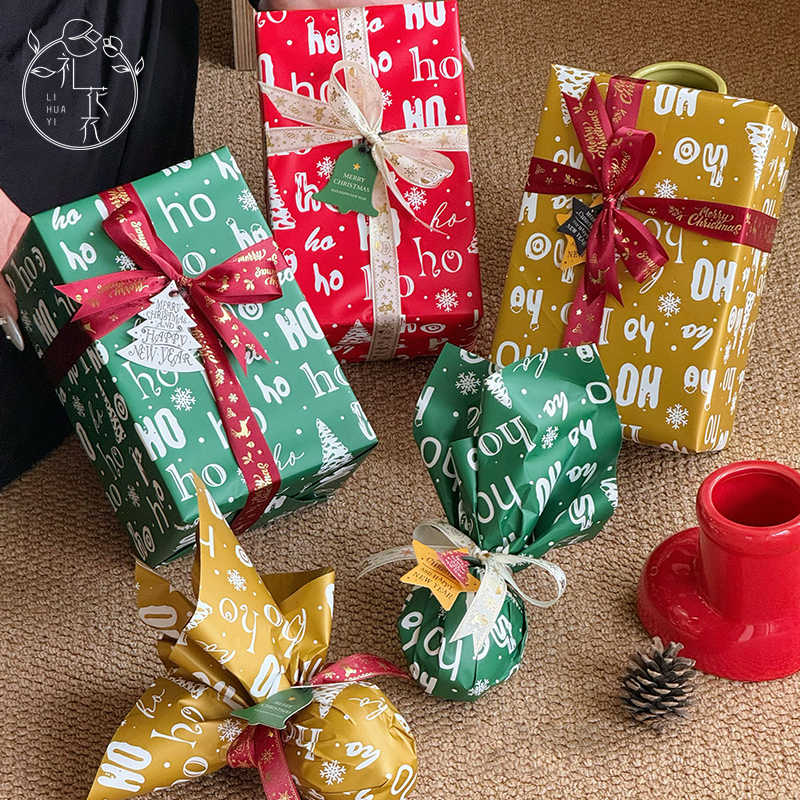 圣诞节礼物包装纸平安夜苹果花束礼盒防水礼品鲜花花艺包花材料