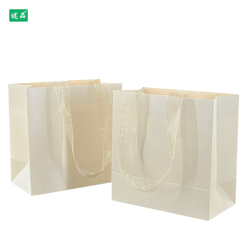 香槟色手提袋服装店创意设计纸袋