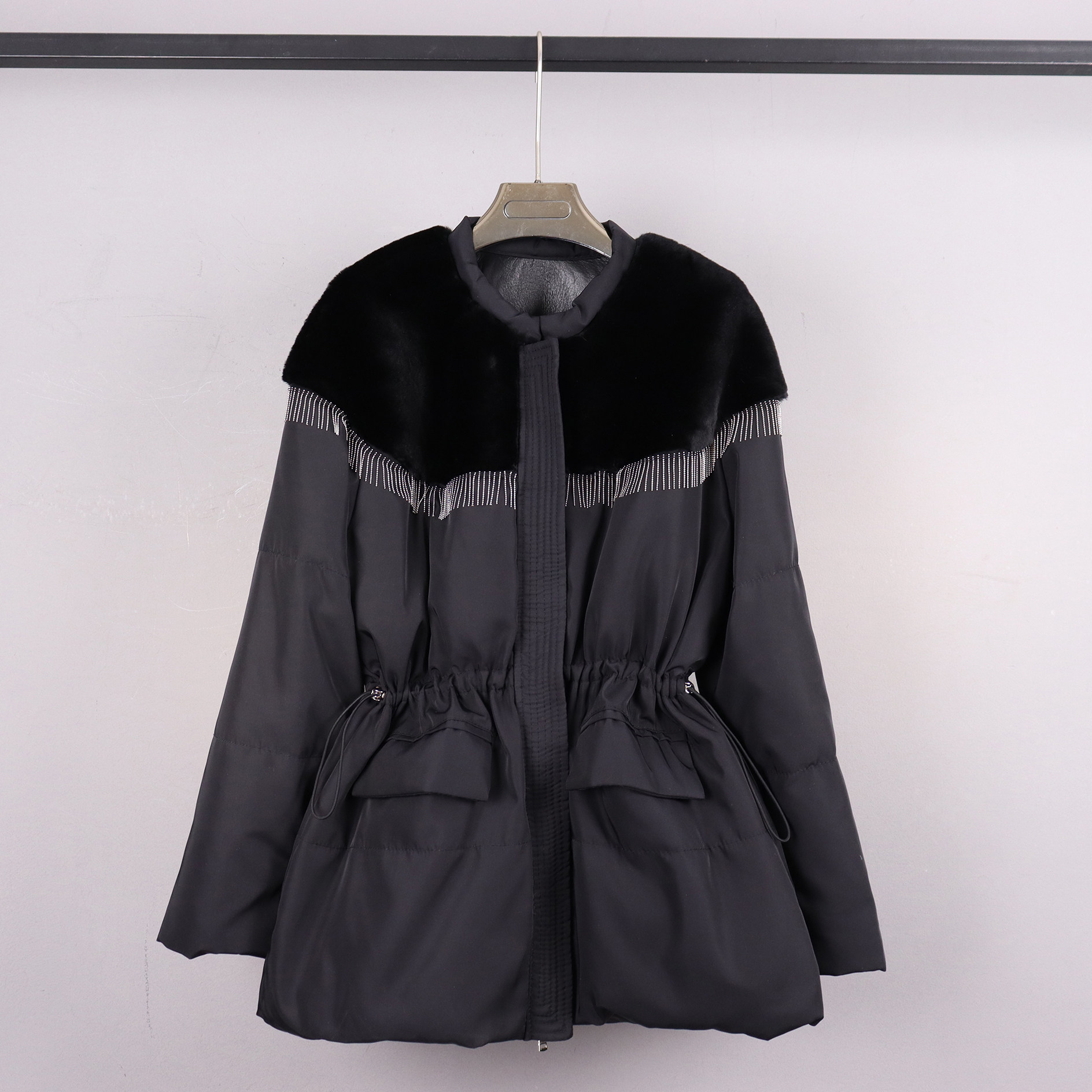 新款女皮毛一体真皮拼接羽绒服