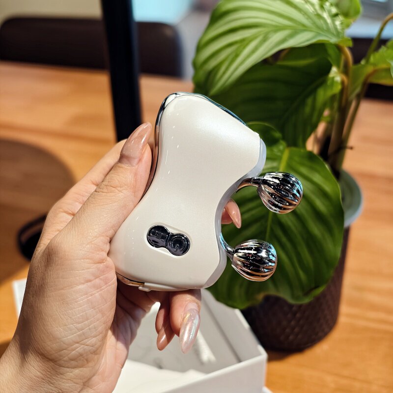 多功能电动面部滚轮瘦脸仪脸部刮痧板加热震动光子导入仪