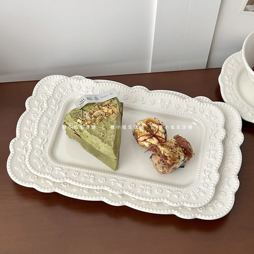 白色浮雕蝴蝶结陶瓷平盘