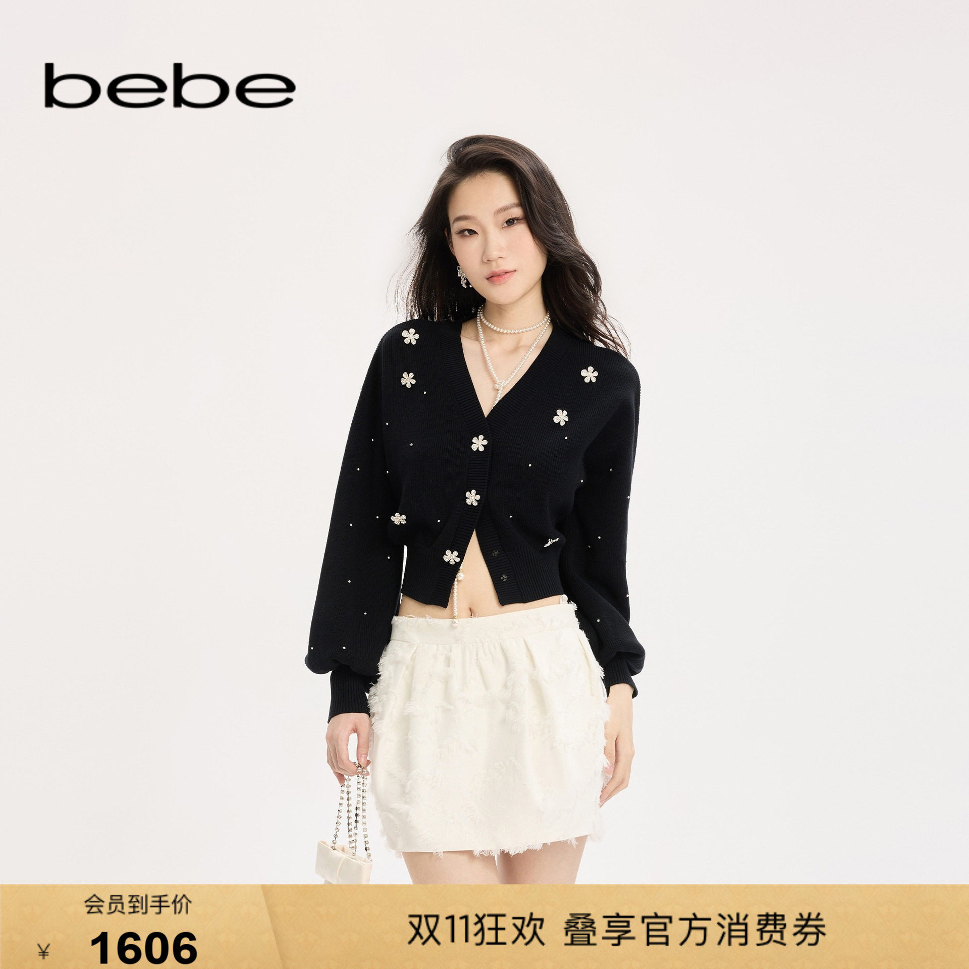bebe女士甜酷风黑色含羊毛深V领灯笼袖针织开衫330601