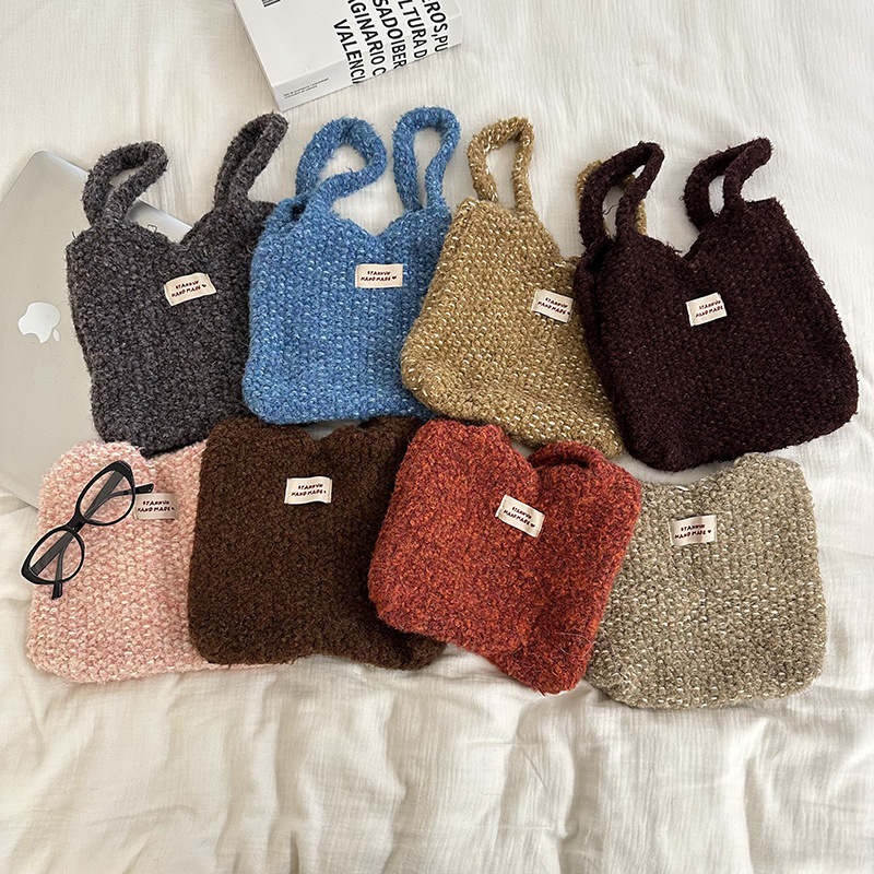 秋冬新款韩版针织手提包女纯色简约百搭毛线大容量编织通勤手拎袋