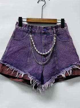 欧货紫色牛仔拼接毛边短裤女夏季新款设计时尚撞色宽松百搭a字裤
