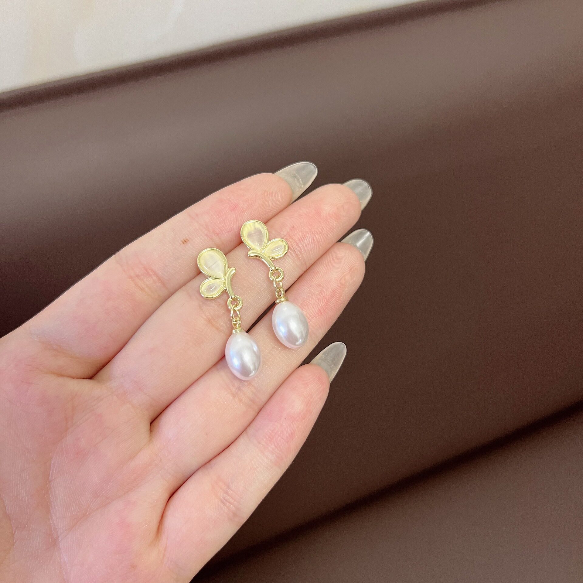 撤柜法式简约清新猫眼石蝴蝶水滴珍珠耳环女小众设计感精致爆款耳