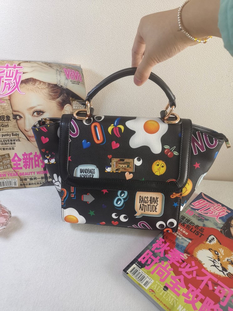 处理新款品牌正品时尚莎萱袋鼠韩版涂鸦潮流包手提斜挎女包百搭