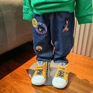 秋冬新款儿童长裤休闲裤卡通可爱黑熊徽章刺绣加绒牛仔裤棉裤