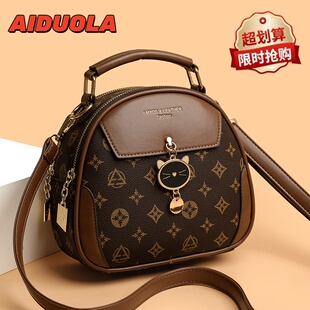 专柜正品真皮女包包2026新款高级感手提小圆包印花中年妈妈斜挎包