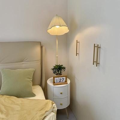 Living room sofa next to coffee table locker floor lamp ins