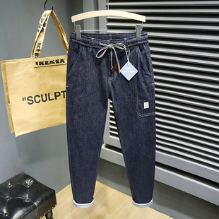 秋季高端牛仔裤男松紧腰弹力修身小脚休闲韩版抽绳2022年新款长裤