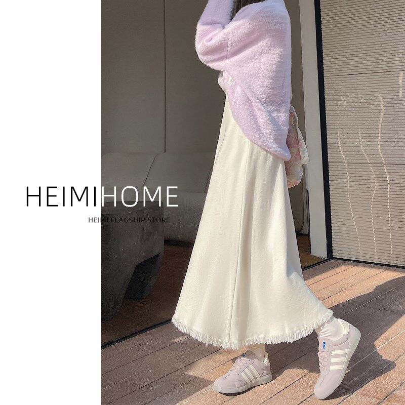 米白色流苏针织裙女秋冬季温柔风a字半身裙小个子中长款大摆长裙