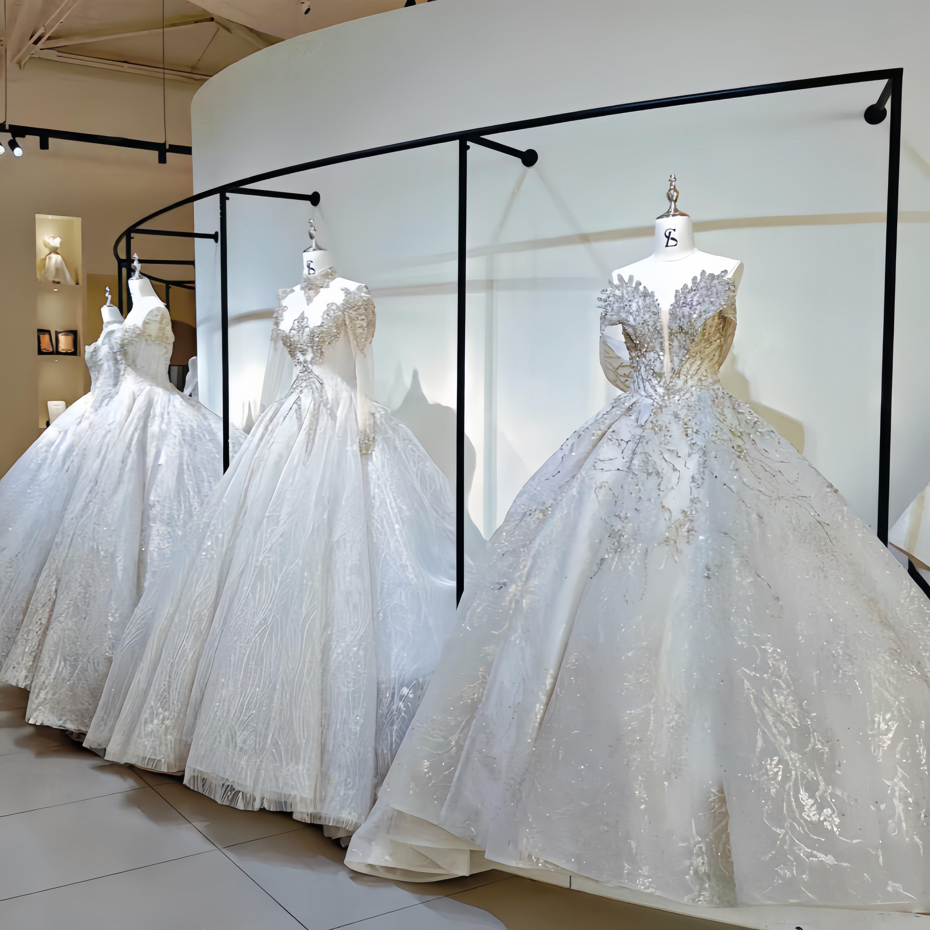 黑色婚纱展示架上墙婚纱侧挂架影楼礼服陈列货架壁挂式秀禾挂衣架